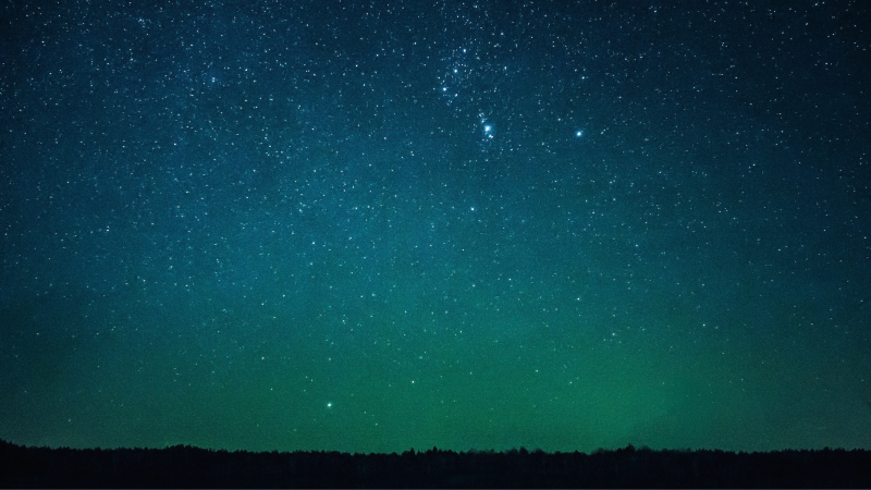 A picture of an open sky with stars